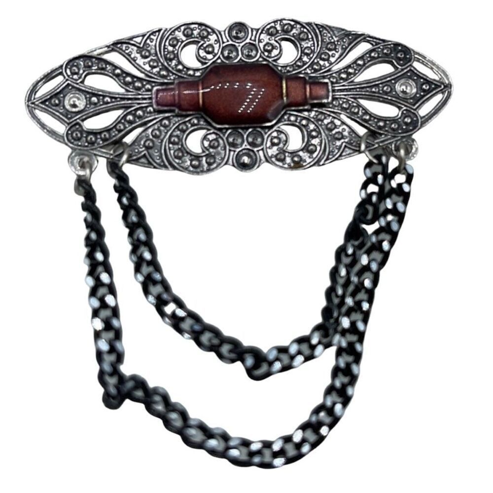 Vintage Victorian looking enamel dropping chains brooch.